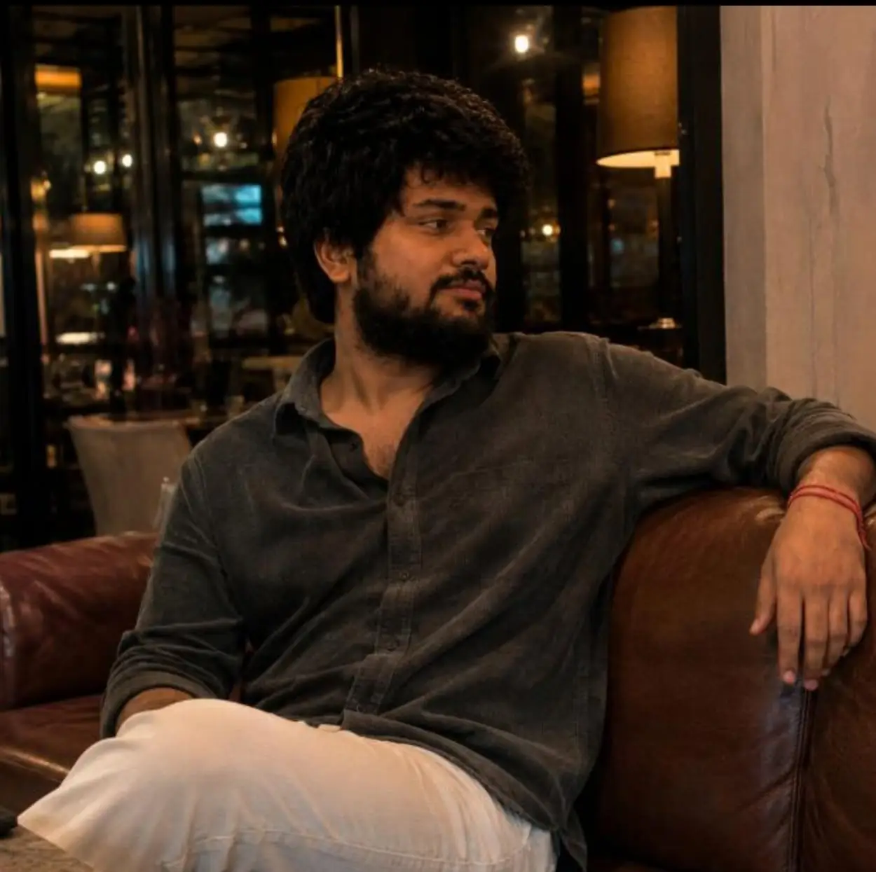 Alok Chaurasiya seated in conversation